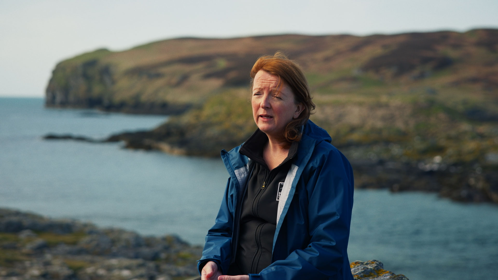 Wildlife conservation video editing featuring Lara, a marine officer, at the stunning Calf of Man landscape.